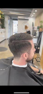 Number 2 on the sides w/ back tapered out, Combover w/ part on top.