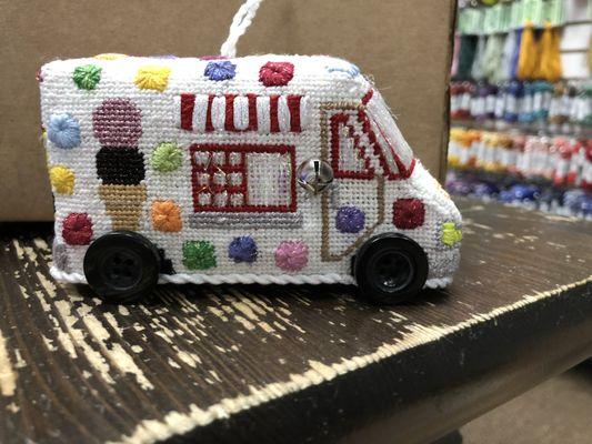 Mini ice cream truck. Check out the wheels- buttons!