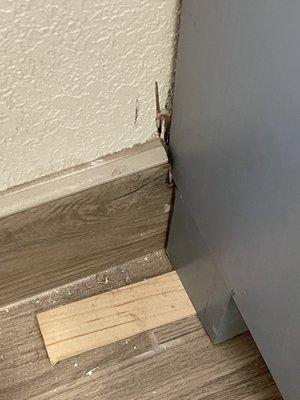 Where he ripped out our brand new porcelain baseboard