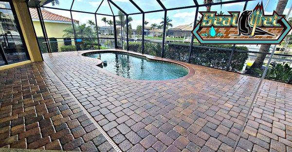 Pool deck with color enhancement and seal