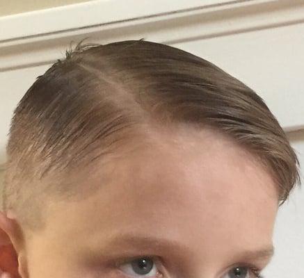 We wanted an undercut, which simply means shave all over and long on top. Looks good slicked or messy.