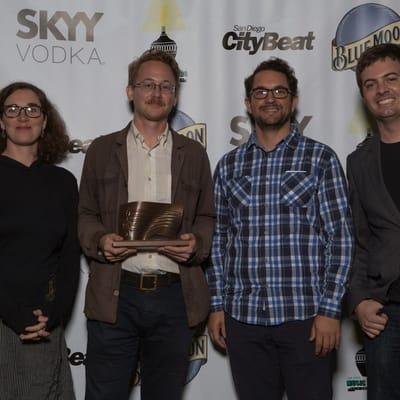 Clinton's band, the G Burns Jug Band, wins a San Diego Music Award.