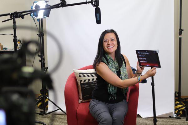 Co-Founder Charlyn Villegas providing on-camera tips on how to use a teleprompter for businesses.