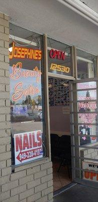 Front entrance of Josephine's beauty salon and "Julie's nails"  contact information