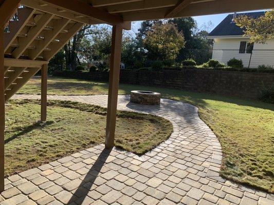 Under the porch/deck looking out to the fire pit.