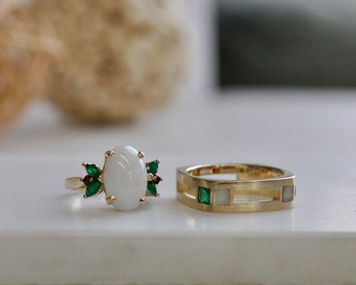 Engagement rings made with marble, emerald, and garnet