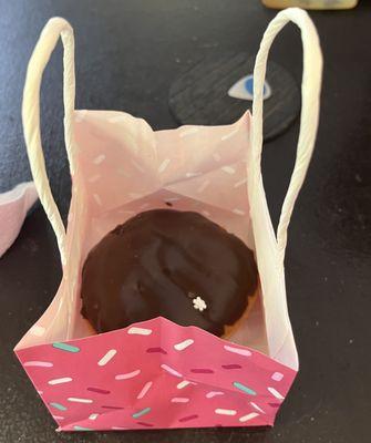 Boston Crème donut in the most adorable bag