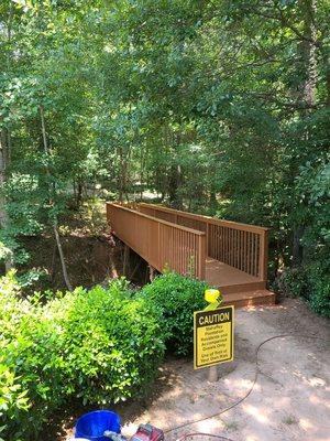 Neighborhood bridge Renovation and new coat of stain