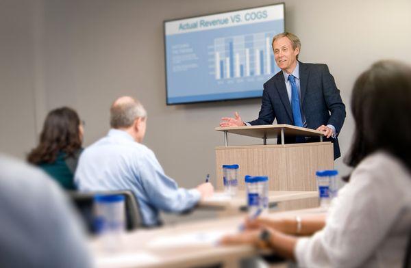 Tim Whittemore, CPA, and CB Smith accountants take part in a business accounting presentation in Alpharetta.