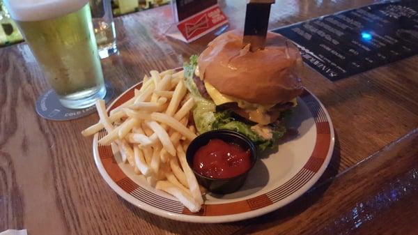 Cheeseburger and fries at bar 1650 in Corona