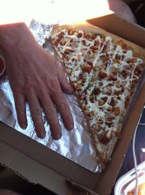 This is a huge slice if pizza!