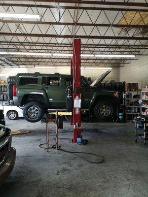 Hummer H3 on a lift.