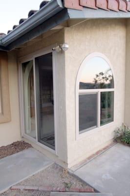 PlyGem Radius Top Half vent retrofit window next to a PlyGem 960 Series retrofit sliding glass door. Fallbrook California