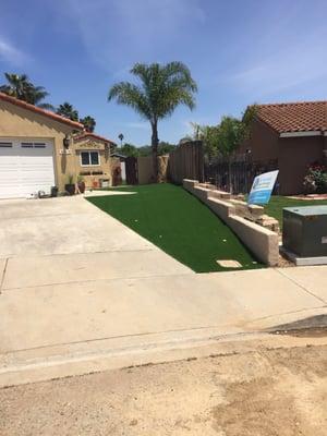 After the Front yard was completed with excellent Turf