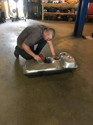 Ryan installing a high performance fuel pump on a mustang