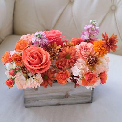 Blood Orange Box with roses, gerbera, bush roses, matthiola, chrysanthemum, marigold, carnations, hydrangea.