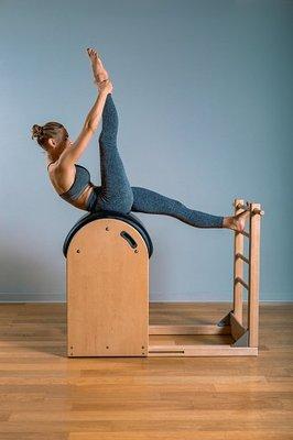 Climbing a tree on the Ladder Barrel is one of my favorites! stretches hamstrings and hip flexors and gives you a nice stretch to your back.