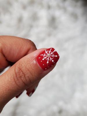 Look at this snow flake! It's not a sticker. She added some glitter to make it sparkle and come to life.