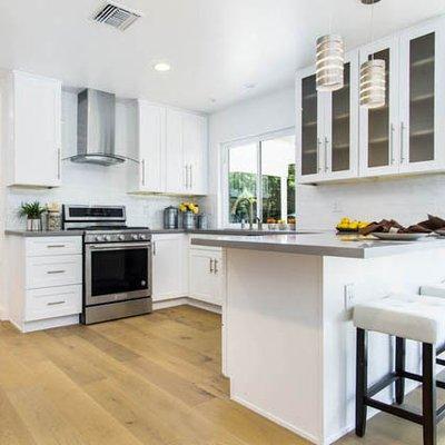 Kitchen remodel - plenty of natural light, white and airy look, modern with grey accents, plenty of storage space and family gathering.