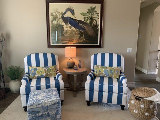 Two chairs and an ottoman that were completed by Capistrano Upholstery.