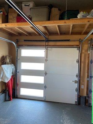 The inside of the chi doors. Spring on top. Well made and installed.