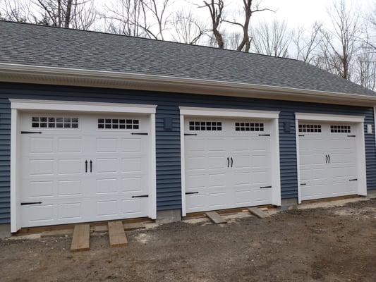 Add character to your new home with new carriage house style garage doors!