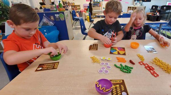 Working on counting, matching and fine motor skills