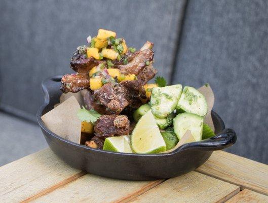 Adobo Pork Ribs, sour mango & habanero salsa, cucumber, lime