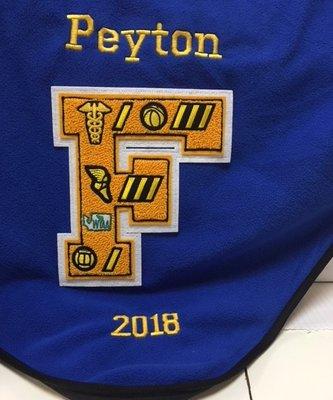 Custom embroidered blanket and chenille for a graduation gift.