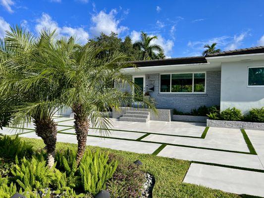 Miami Shores: Designer Concrete Slabs, artificial turf infill. Designed by Shosh vant Verlaat, installed by Driveways by Design