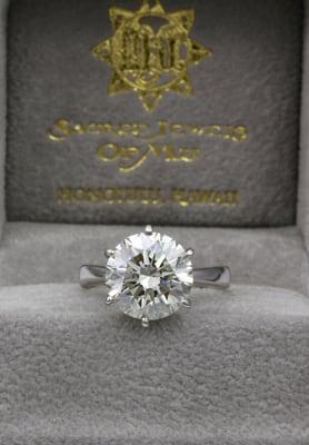 5.00 carat round brilliant ideal cut diamond ring in platinum 6 prong solitaire setting.