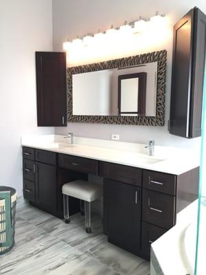 Double vanity in "espresso" Shaker style cabinets