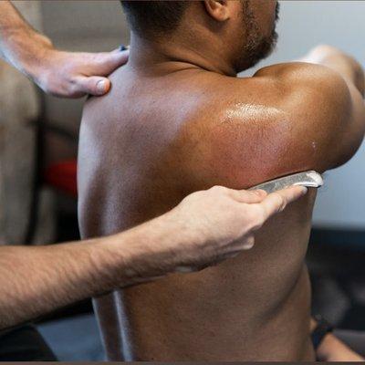 Scraping for shoulder massage