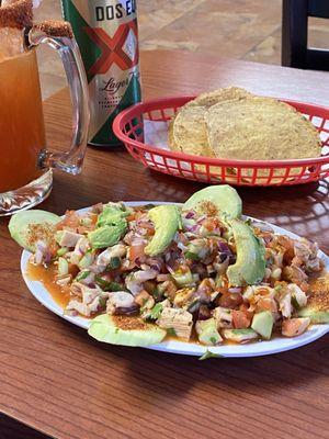 Shrimp,octopus,abalone tostada and a cold michilada