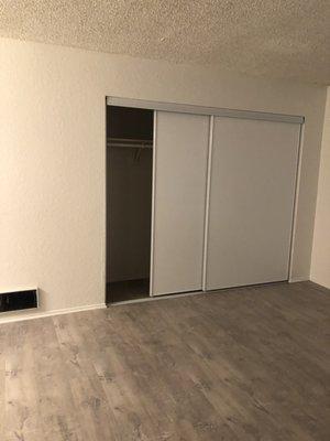 Bedroom with sliding wardrobe doors