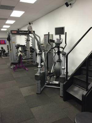 One side of the gym...smaller gym but has everything you need.