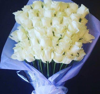 Beautiful White Long stem Roses, Pageant style Bouquet wrapped with a beautiful bow. Very elegant