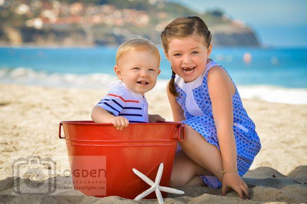 Ogden Photography photographed these adorable kids parents engagement and wedding photos!