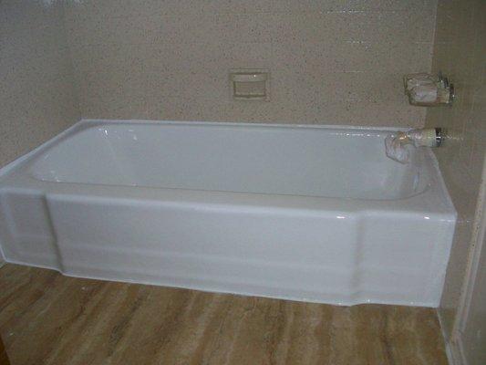 Porcelain tub & Tile enclosure (after) Tub reglazed in glossy white. Tile enclosure in almond speckle finish