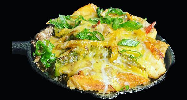 Loaded Potato Skillet
With Chicken Beef, Shrimp Gravy and Cheese