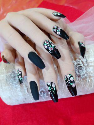 Black Garden on long coffin nail design.