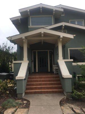 A second-story and front porch addition