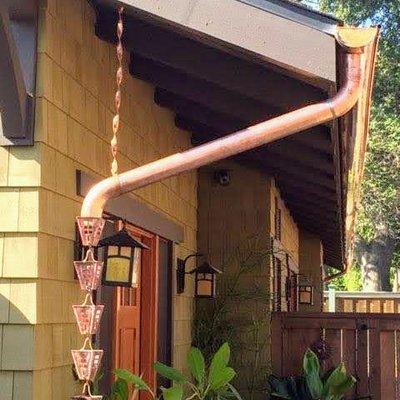 New copper gutters and rain chains