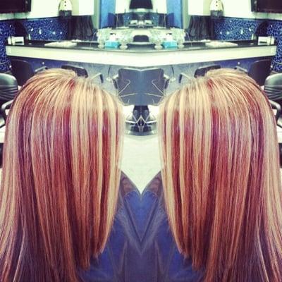 Hair by: Devon
 Warm base color with reddish brown lowlights and golden blonde highlights