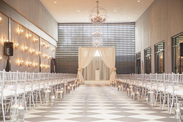 A stunning wedding ceremony aisle in the Courtyard at Flourish.