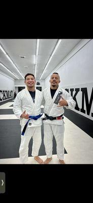 Sinistro (RIGHT) promoting me to blue belt. #TrustInTheProcess