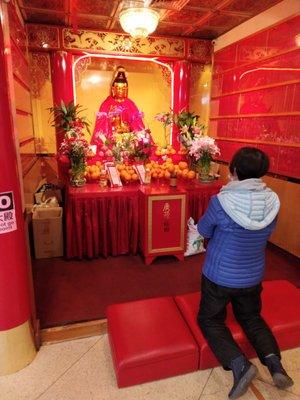 Red everywhere! For Chinese people, red is the  color of power and prosperity. I lit the inscence and prayed to the beautiful Buddha.