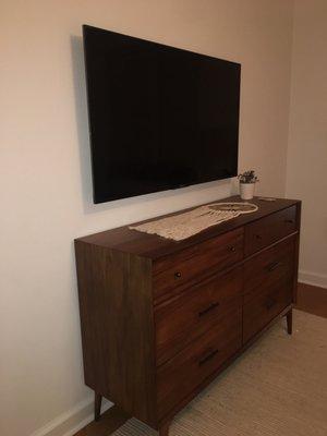 Installed 55" wall-mounted TV & recessed outlet box behind. All wires hidden behind the TV, yay!