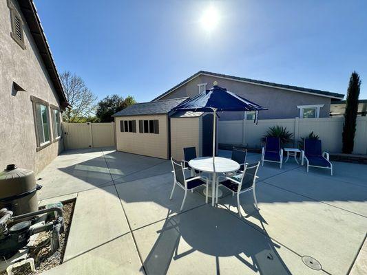 Custom pool deck extension with two shed pads.