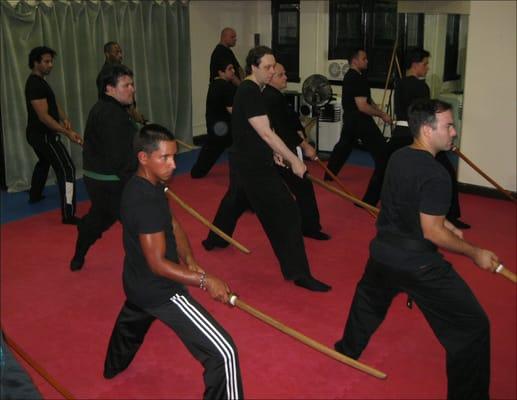 Class working on sword forms.